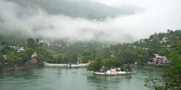 Original photograph of Bhimtal Lake beneath misty hills